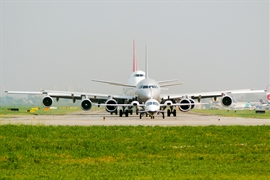 Planes of different sizes in line for take-off